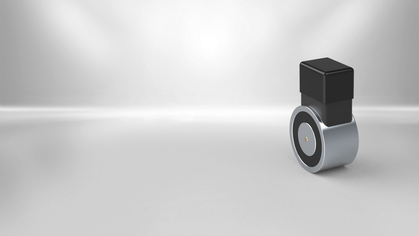 Electro holding magnets are pot magnets and consist of a magnet housing and a DC-excited coil. The magnetic circuit which is open in switched-on state allows for holding ferromagnetic workpieces.